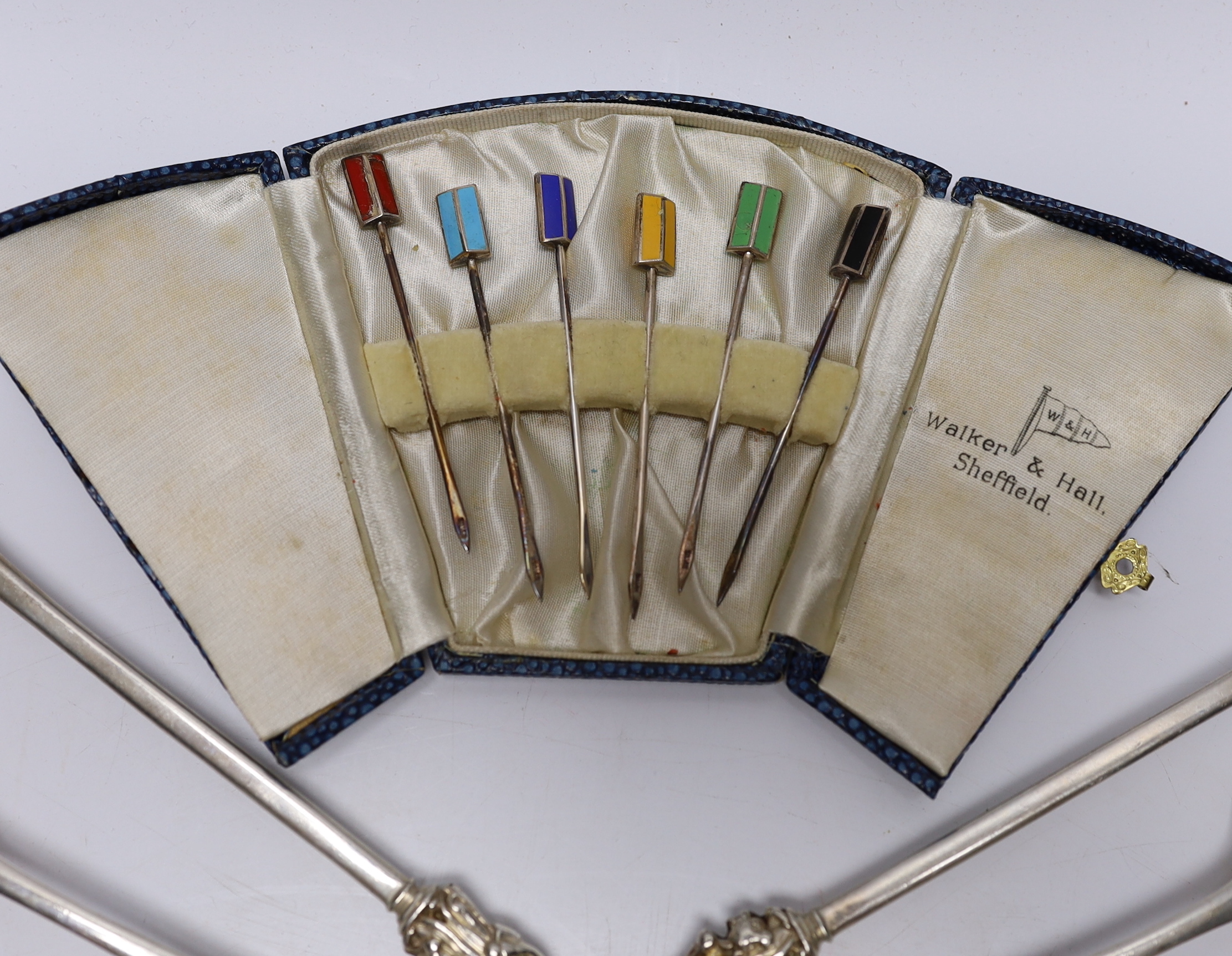 A pair of Edwardian silver apostles spoons, Josiah Williams & Co, London, 1902, 19.5cm and a small quantity of assorted silver flatware including pair of Victorian butter knives and a case of six silver and enamel cockta